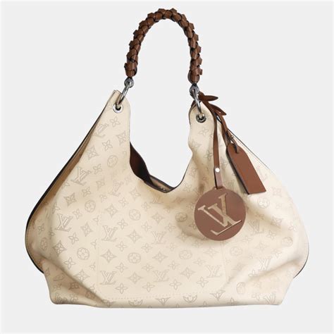 louis vuitton cream|Louis Vuitton mahina carmel bag.